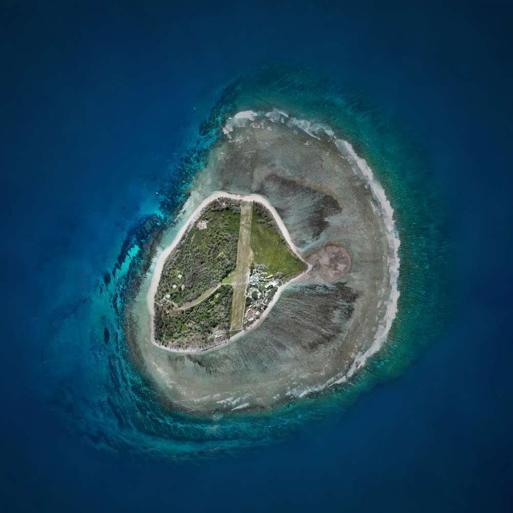 A top-down aerial drone mosaic of Lady Elliot Island on the Great Barrier Reef.