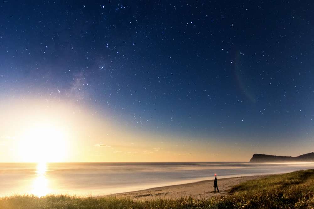 Long exposure moonrise on Seven Mile Beach in Lennox Head, Australia.