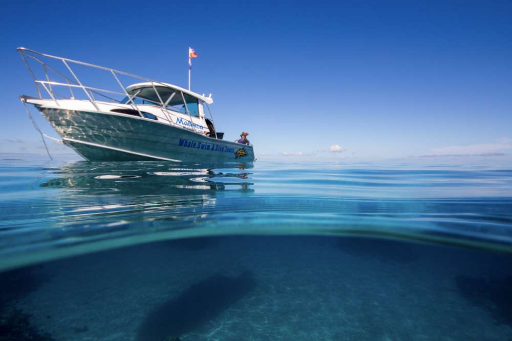 Over-under Split Shot of Boat on Turquoise Water