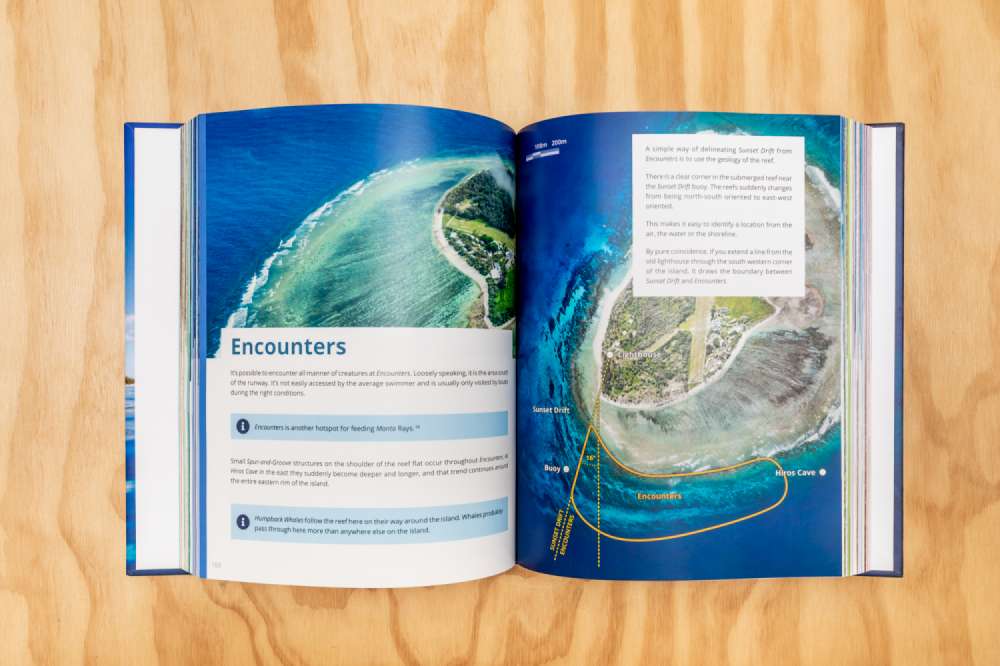 The Visual Guide to Lady Elliot Island open to Encounters page.